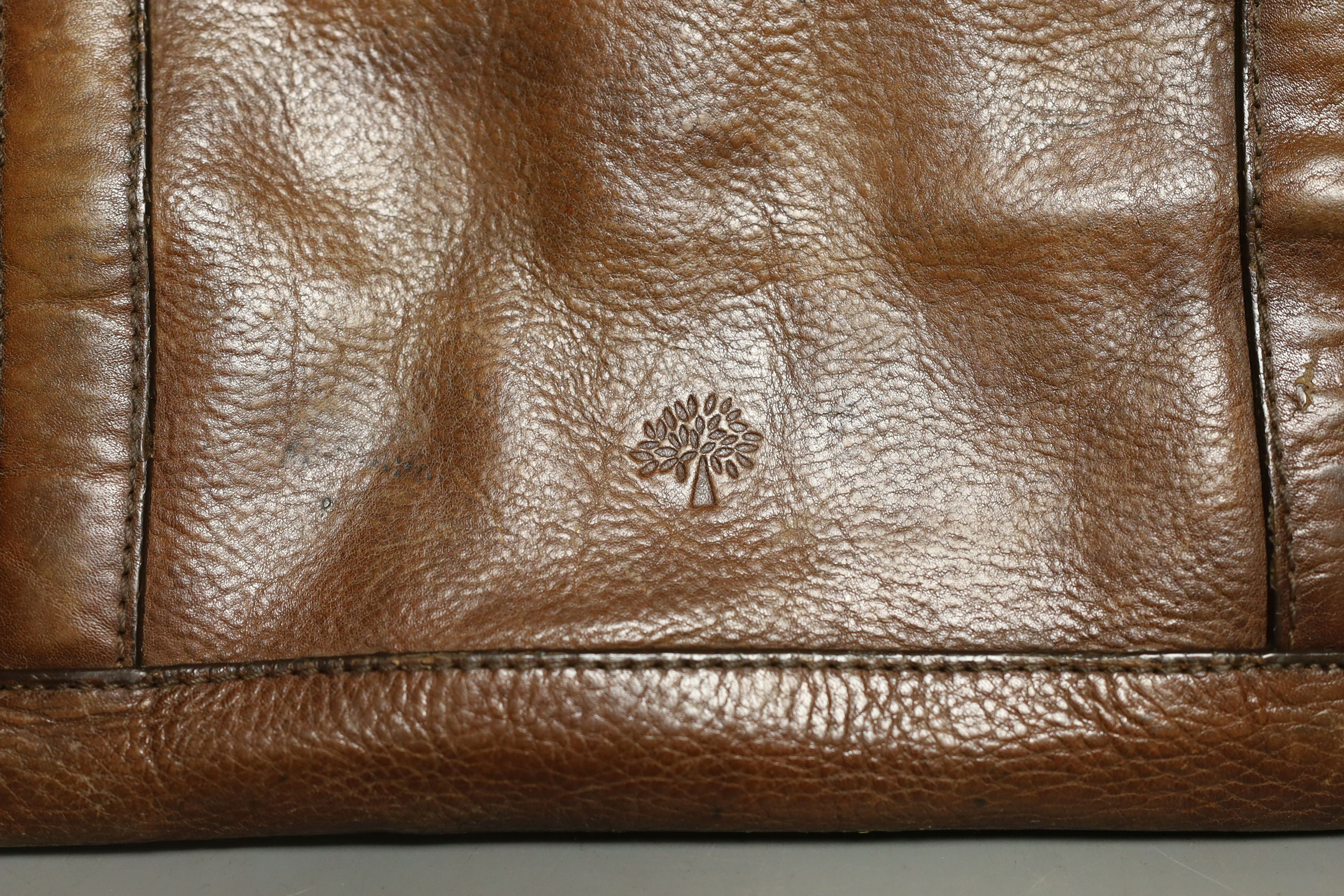 A vintage, Mulberry brown leather ‘shopper’, bag, with shoulder straps, 35 cms high x 52 cms wide.